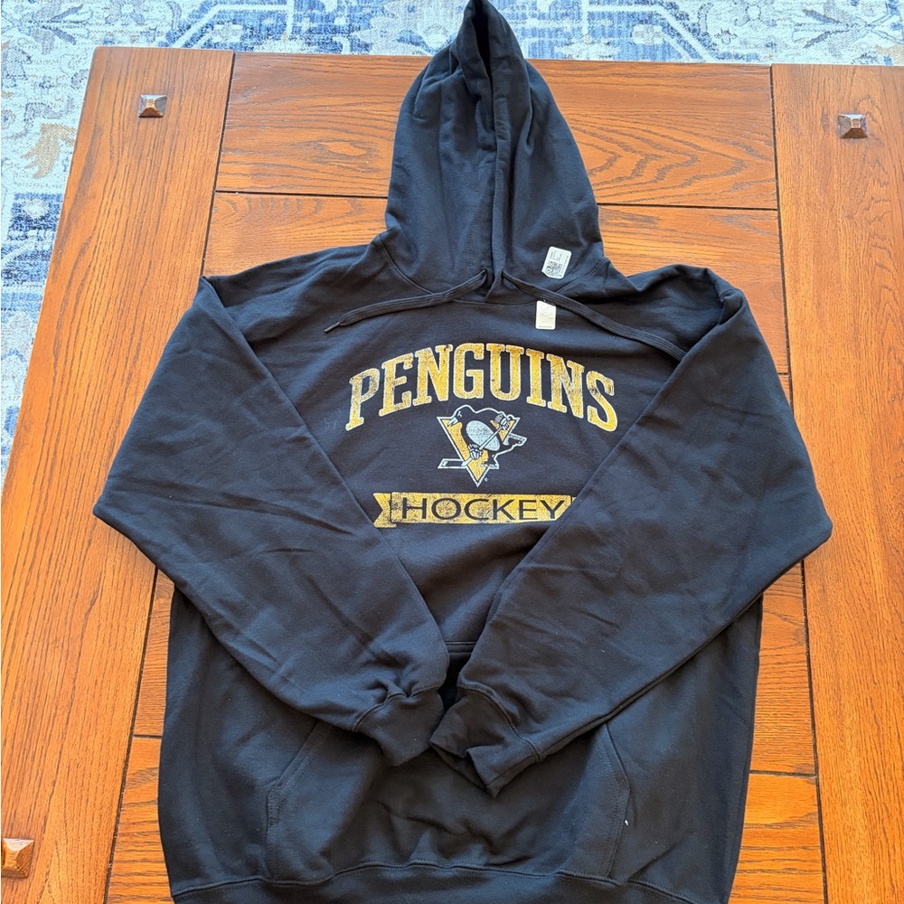 Black Penguins Hockey Pullover Hoodie with Gold Logo